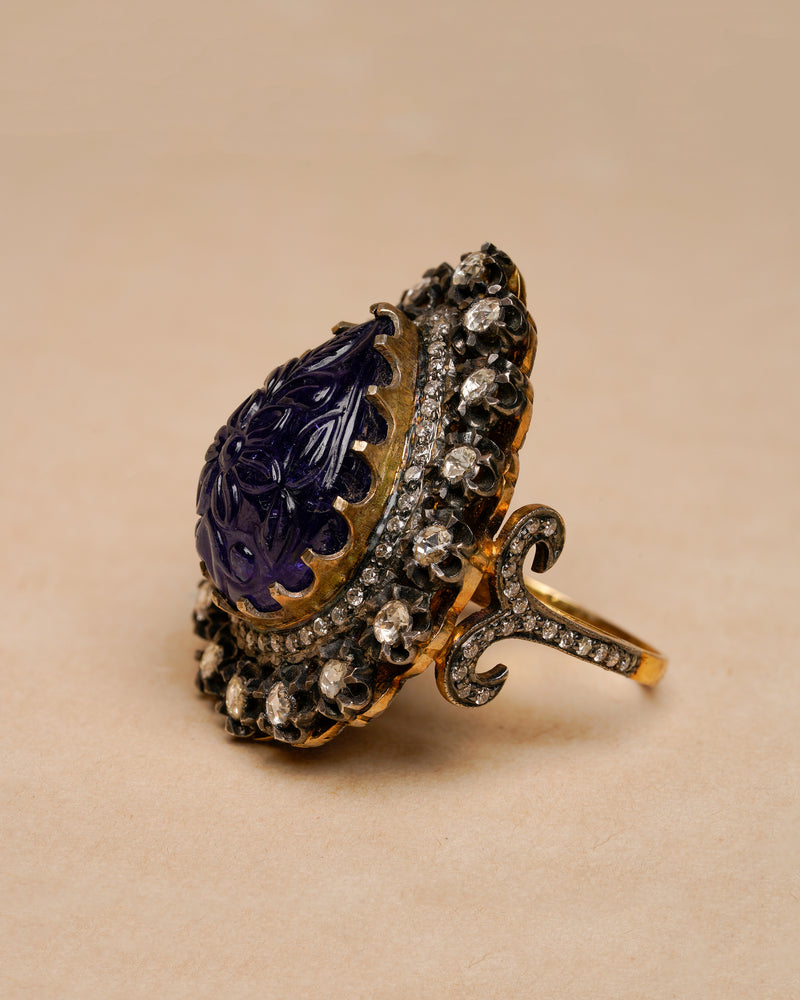DEEP BLUE CARVED TANZANITE RING WITH ROSECUT DIAMONDS